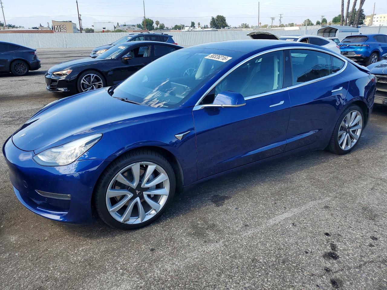 2019 Tesla Model 3 Long Range, VIN 5YJ3E1EB2KF497488 — Rear end