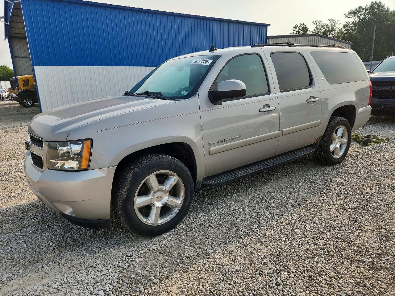 2009 Chevrolet Suburban 2LT, VIN 1GNFK26369J106677 — Hail