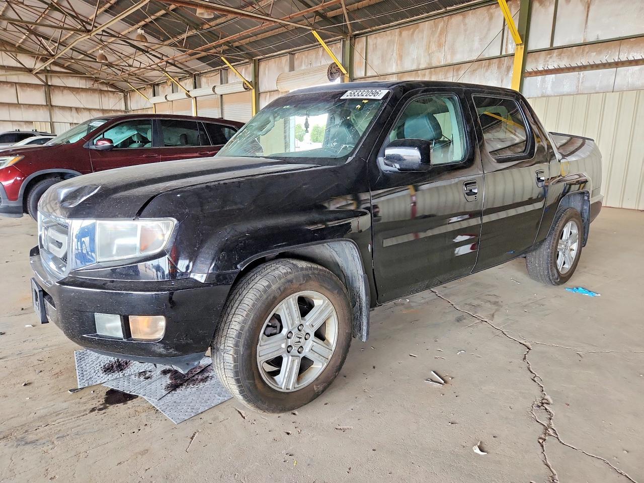 2011 Honda Ridgeline RTL, VIN 5FPYK1F52BB001393 — Side