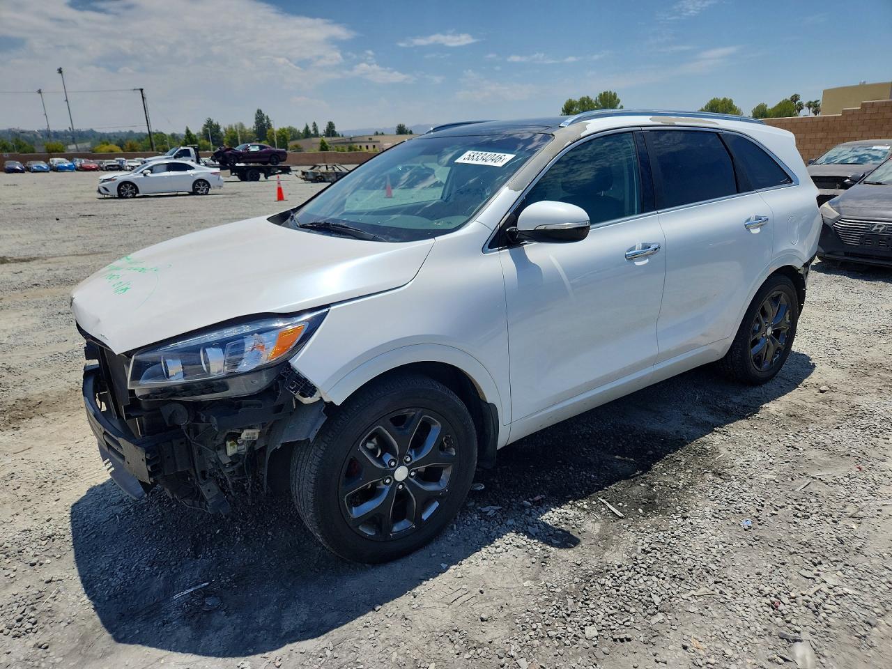 2016 Kia Sorento SXL, VIN 5XYPK4A54GG116574 — Front end