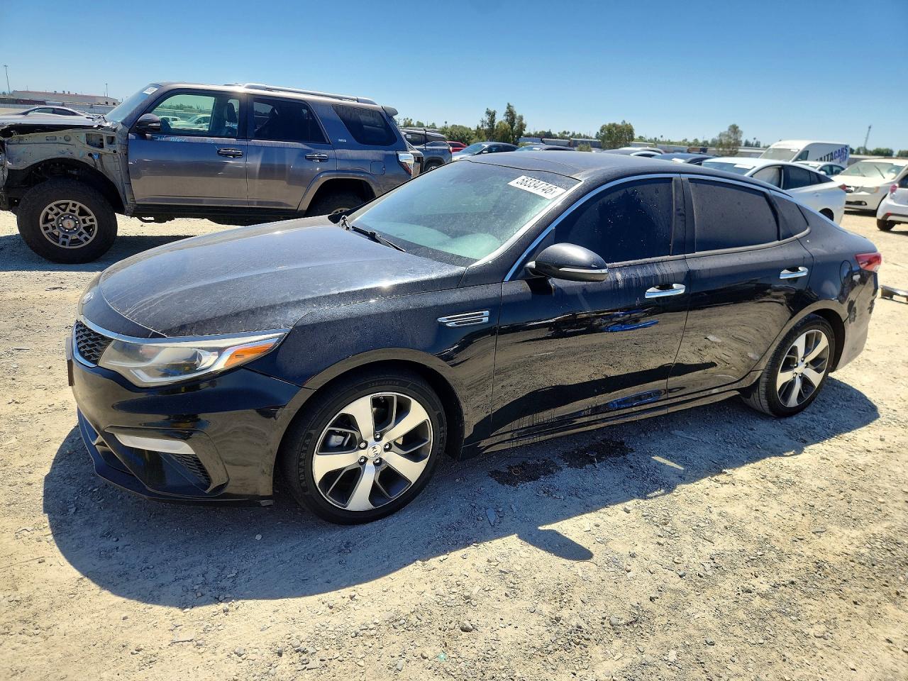2019 Kia Optima LX, VIN 5XXGT4L33KG294787 — Side
