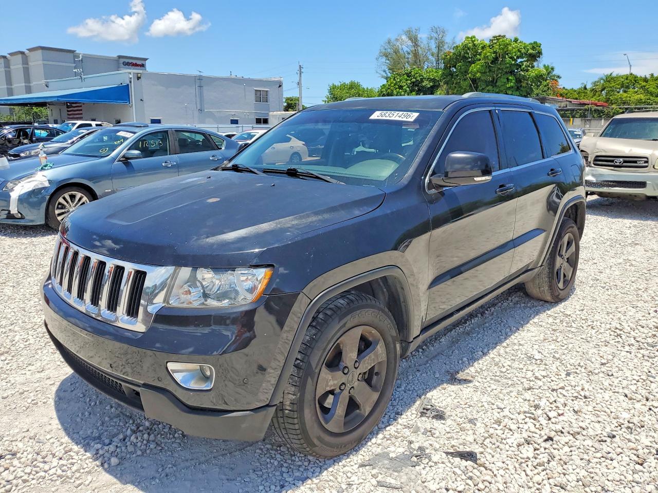 2013 Jeep Grand Cherokee Laredo, VIN 1C4RJEAGXDC589107 — Engine fire