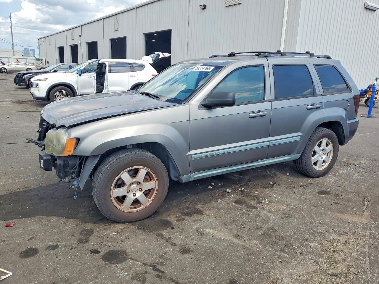 2008 Jeep Grand Cherokee Laredo, VIN 1J8GS48K48C128993 — Front end
