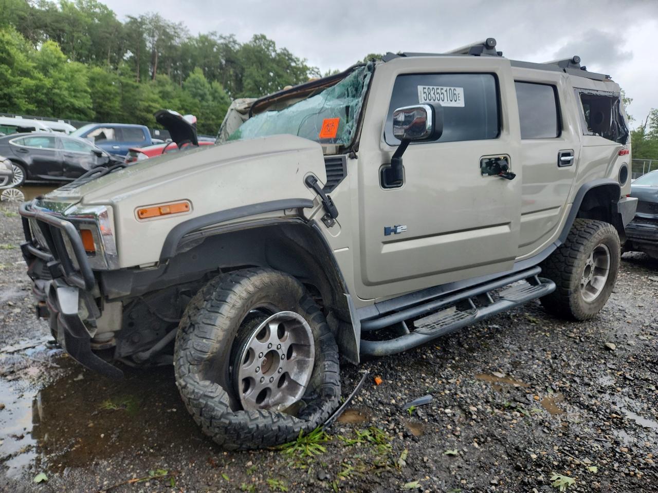 2003 Hummer H2, VIN 5GRGN23U83H129781 — Rollover