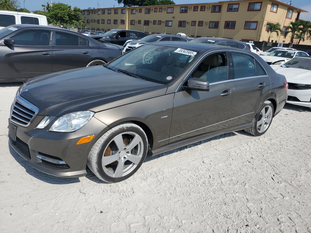 2012 Mercedes-Benz E 350 Luxury, VIN WDDHF8JB1CA658608 — Minor dents and scratches