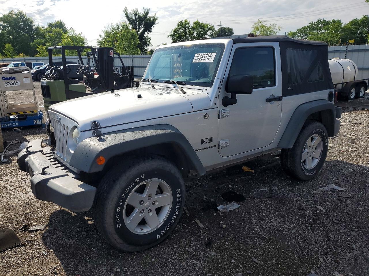 2009 Jeep Wrangler X, VIN 1J4FA24149L764039 — Front end