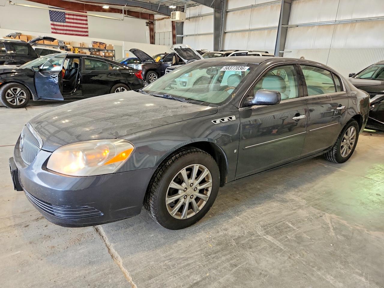 2009 Buick Lucerne CXL-4, VIN 1G4HD57M29U115567 — Side