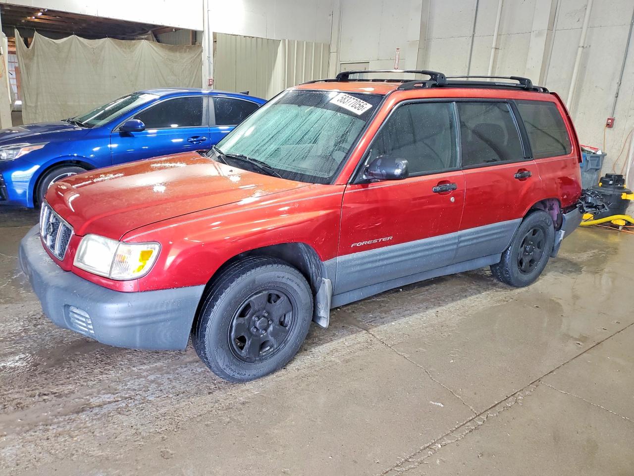 2002 Subaru Forester L, VIN JF1SF63592G754371 — Зад