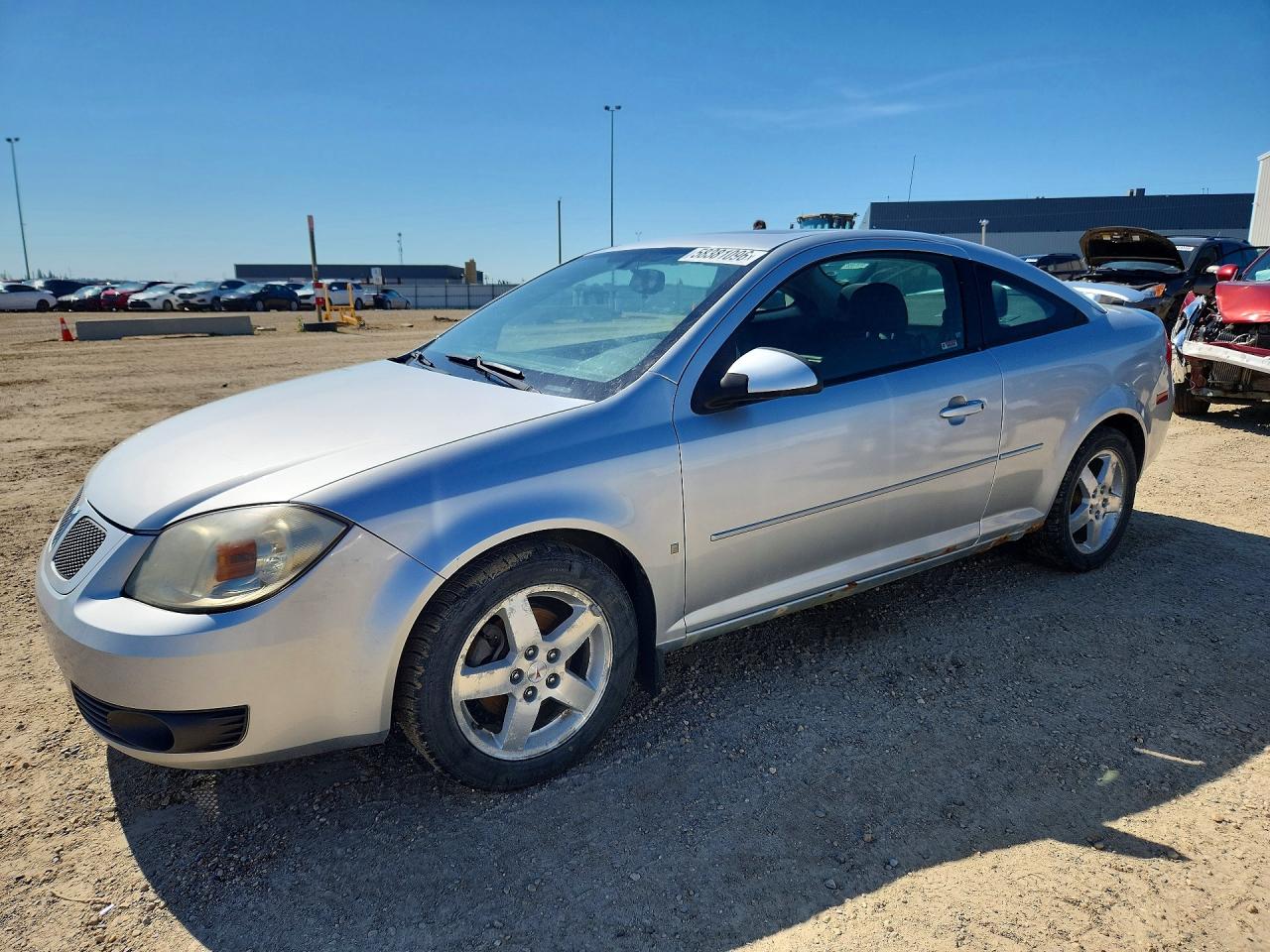 2009 Pontiac G5, VIN 1G2AS18H597217700 — Minor dents and scratches