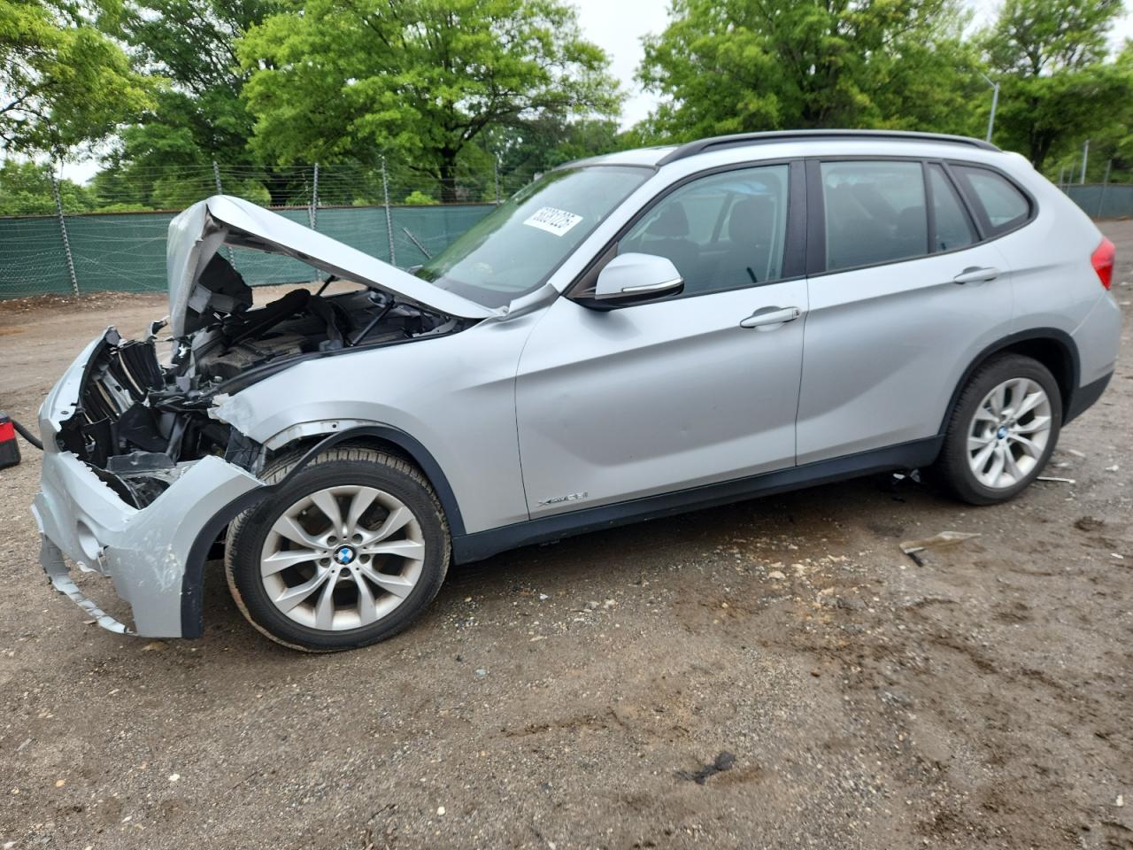 2013 BMW X1 xDrive28i, VIN WBAVL1C59DVR84636 — Front end