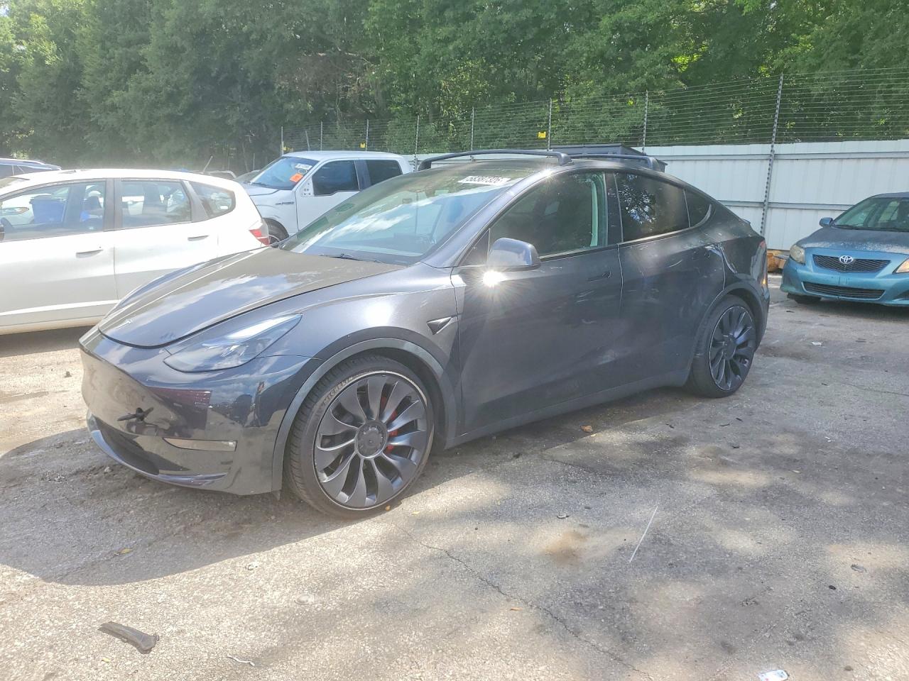 2024 Tesla Model Y Performance, VIN 7SAYGDEF8RF039486 — Side