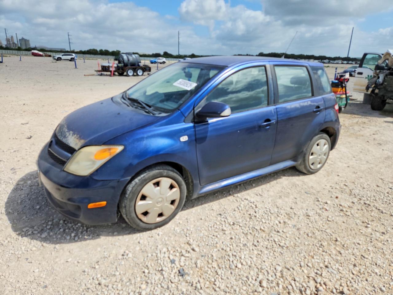 2006 Scion xA, VIN JTKKT624160144242 — Side