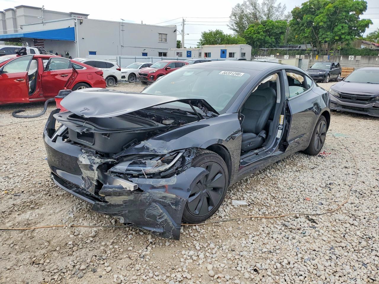 2026 Tesla Model 3 Premium, VIN 5YJ3E1EA6TF125497 — Front end