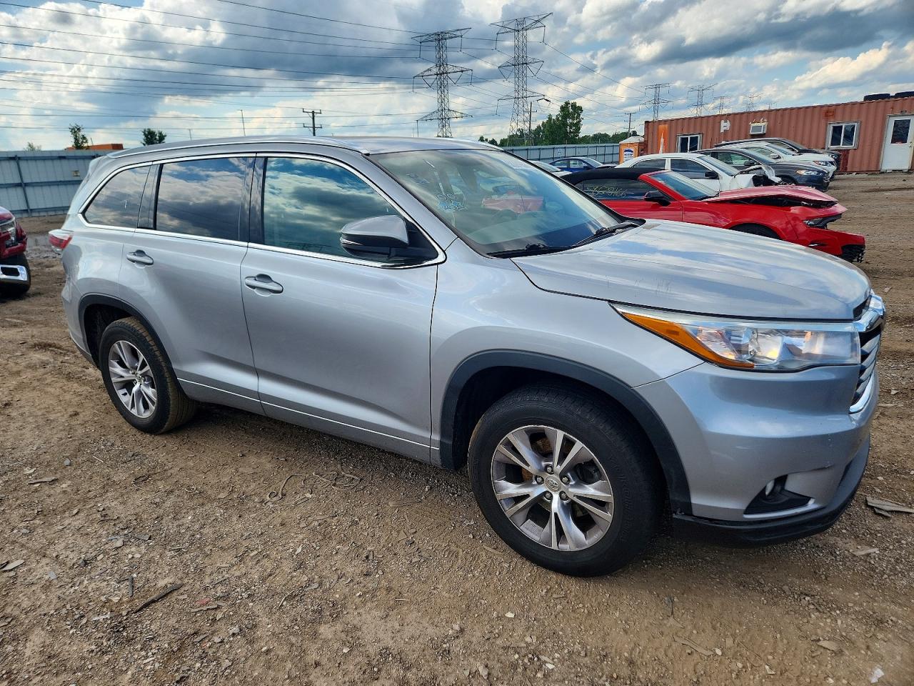 2015 Toyota Highlander XLE, VIN 5TDKKRFH6FS067700 — Side