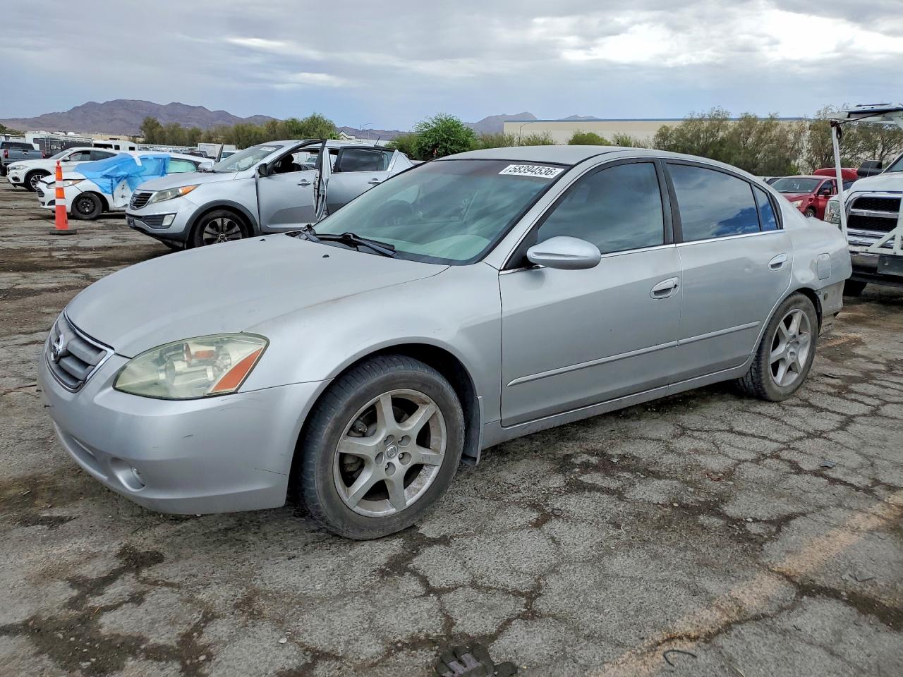 2004 Nissan Altima SE, VIN 1N4BL11D14C143461 — Зад
