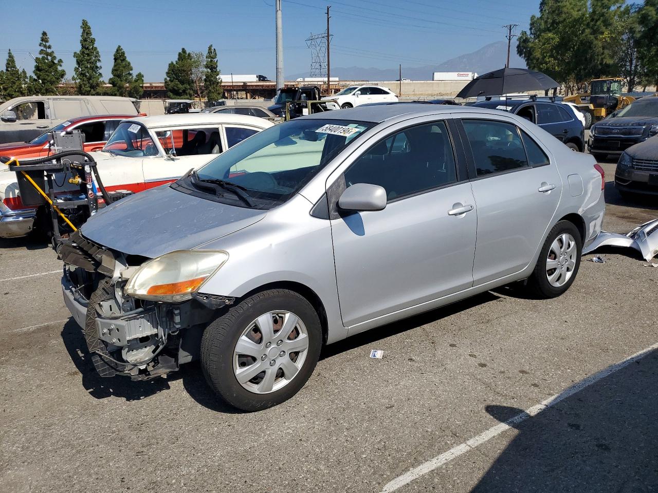 2009 Toyota Yaris, VIN JTDBT903191325357 — Front end