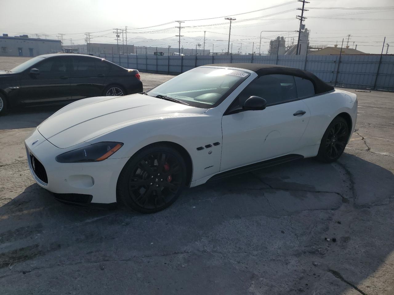 2012 Maserati GranTurismo Sport, VIN ZAM45MMAXC0064608 — Side