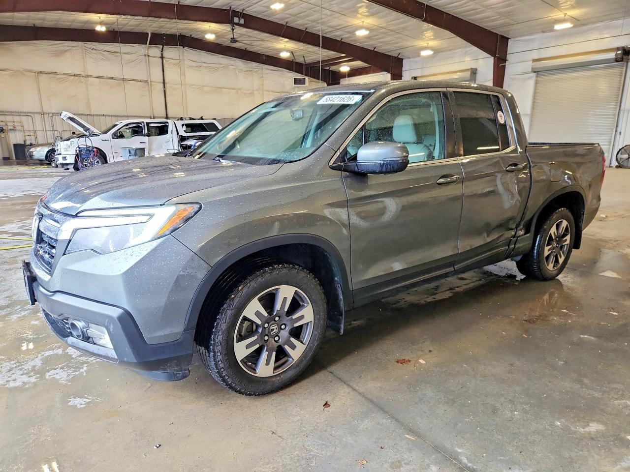 2018 Honda Ridgeline RTL-T, VIN 5FPYK3F65JB001424 — Side