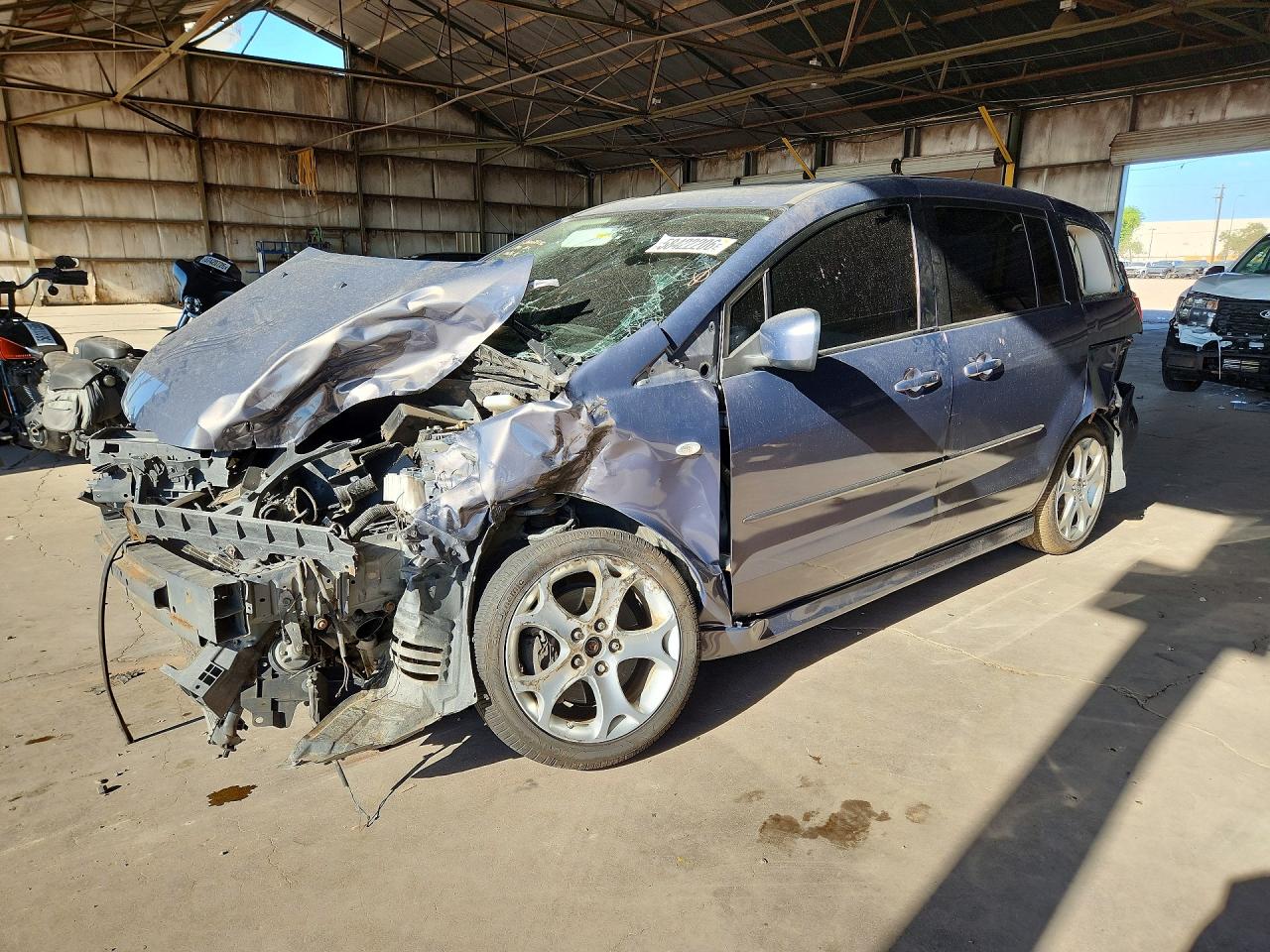 2009 Mazda 5 Touring, VIN JM1CR29L690331626 — Front end