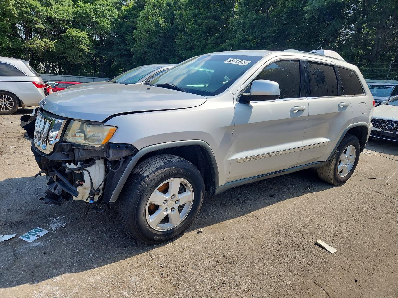 2011 Jeep Grand Cherokee Laredo, VIN 1J4RS4GGXBC643964 — Front end