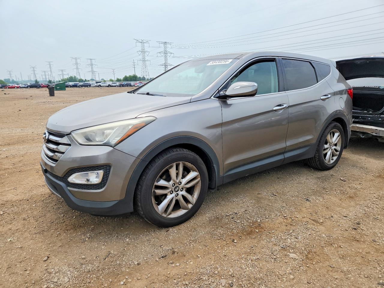 2013 Hyundai Santa Fe Sport, VIN 5XYZWDLA9DG061901 — Front end