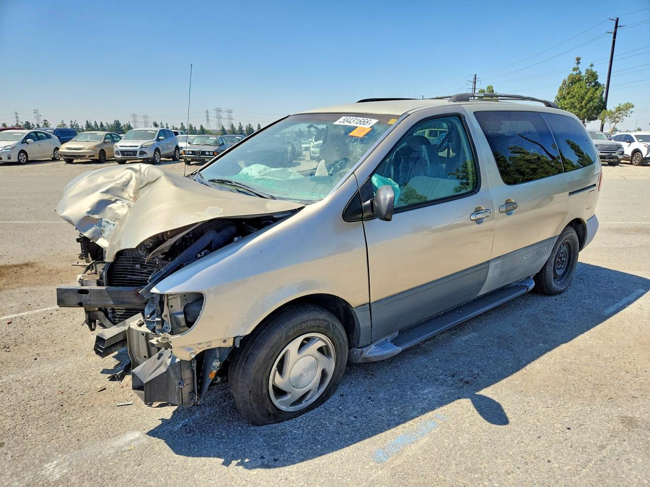 2000 Toyota Sienna LE, VIN 4T3ZF13C0YU199480 — Front end