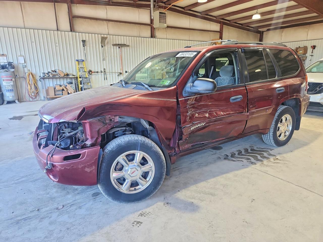 2003 GMC Envoy SLE, VIN 1GKDT13S732183289 — Side