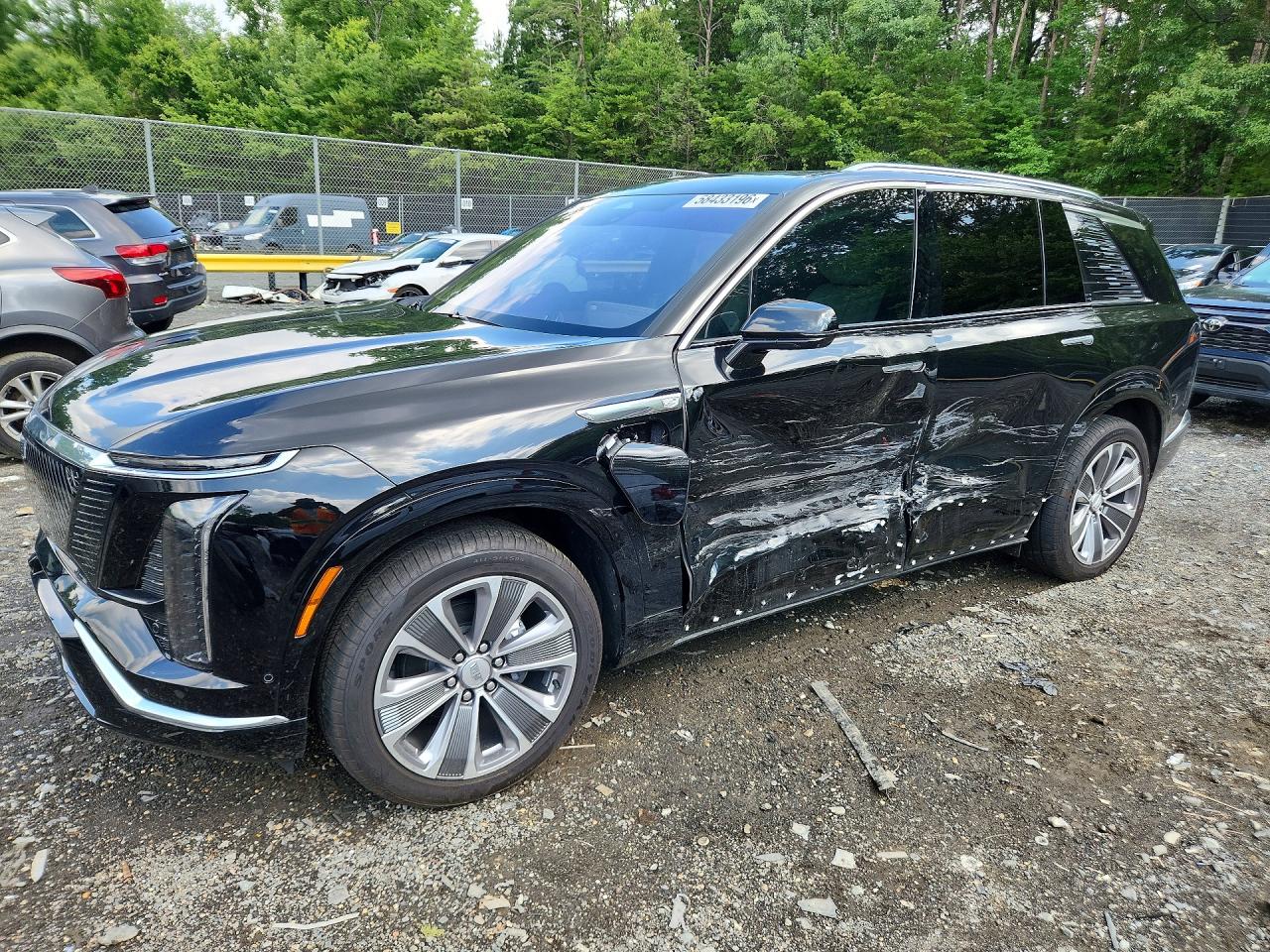 2026 Cadillac Vistiq Luxury, VIN 1GYC3KML8TZ701349 — Бок