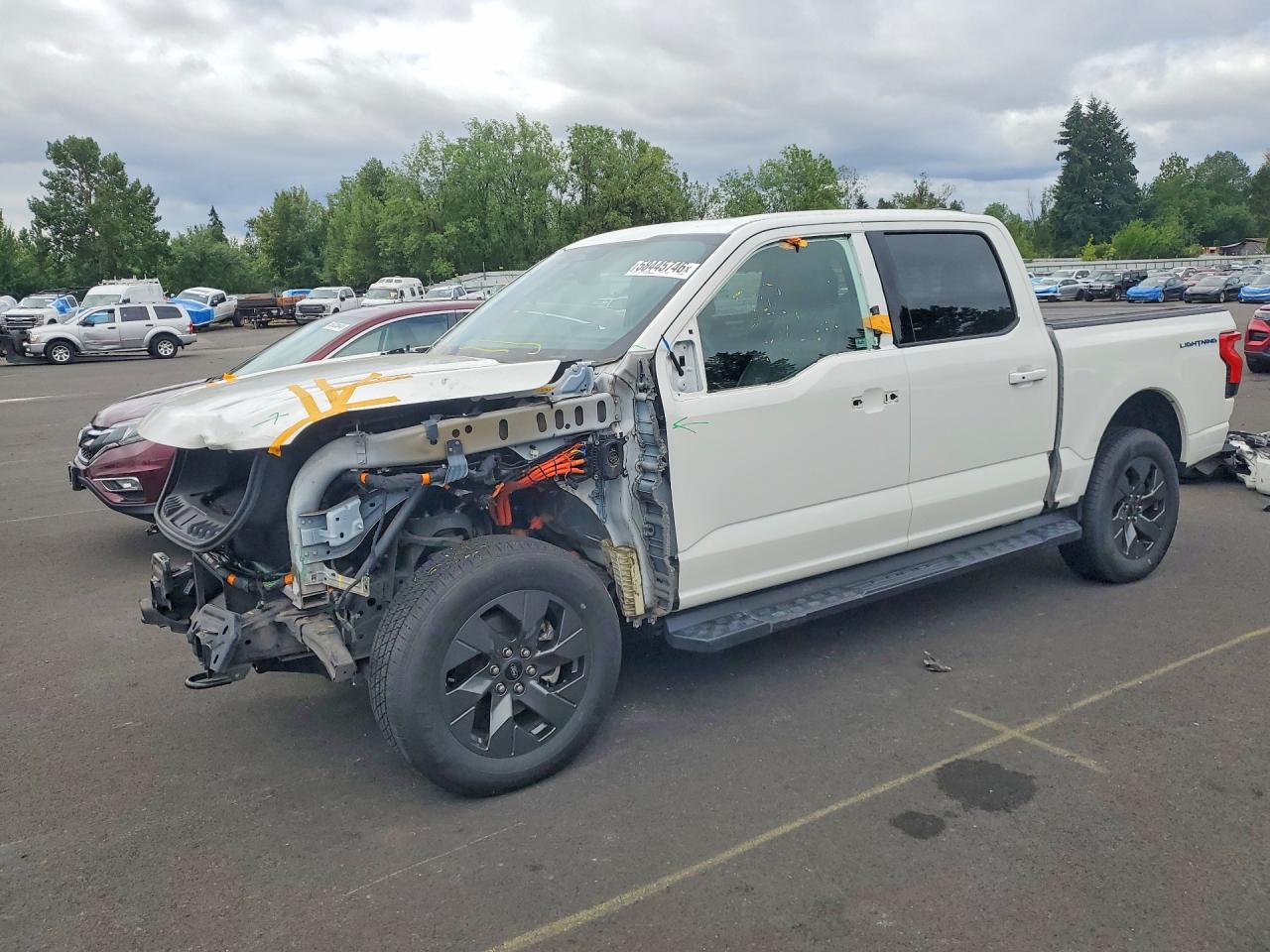 2023 Ford F-150 Lightning Lariat, VIN 1FT6W1EV8PWG60037 — Front end
