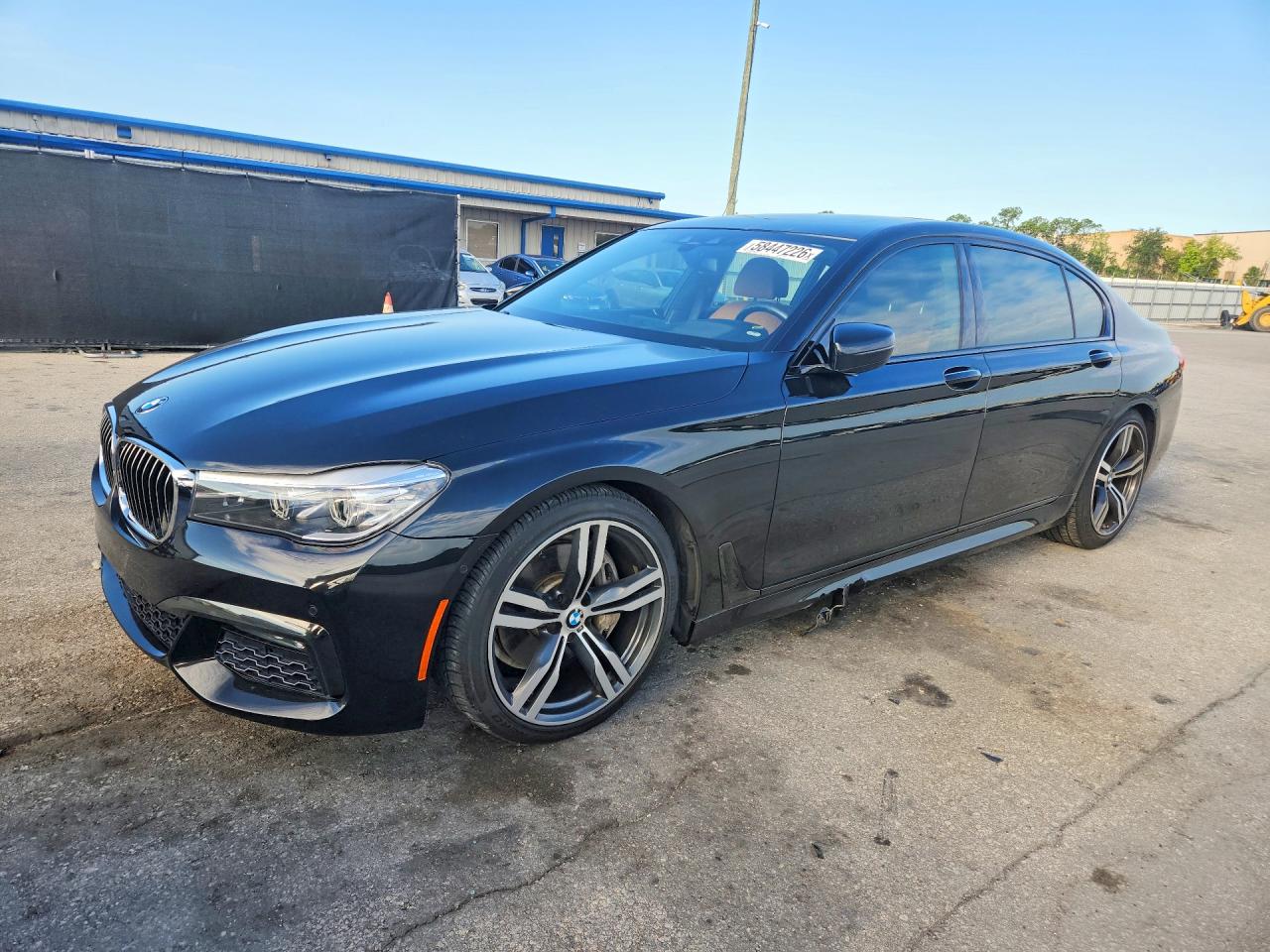 2018 BMW 7 Series 740i, VIN WBA7E2C5XJG742270 — Side