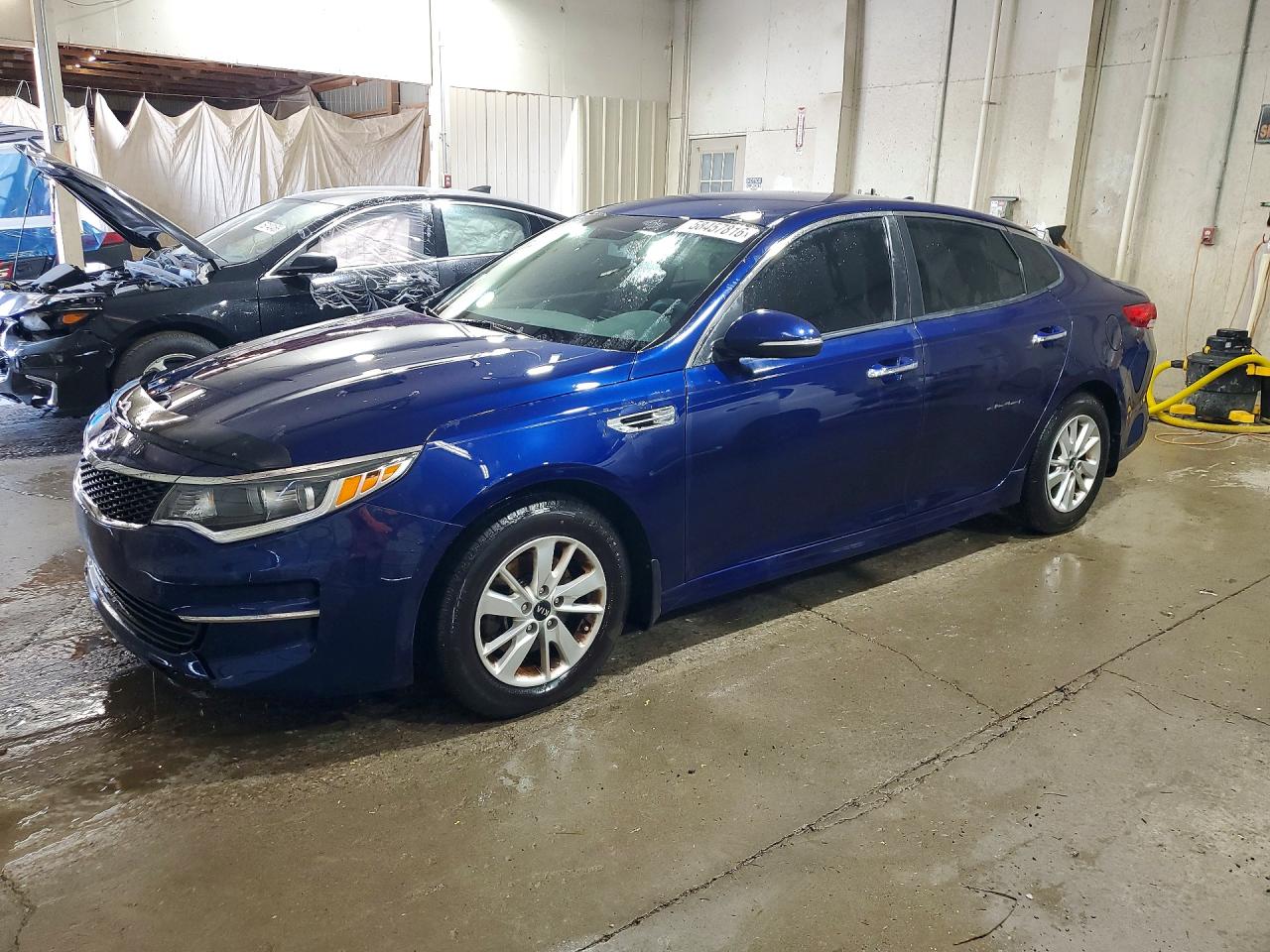 2016 Kia Optima LX, VIN 5XXGT4L39GG113666 — Engine fire