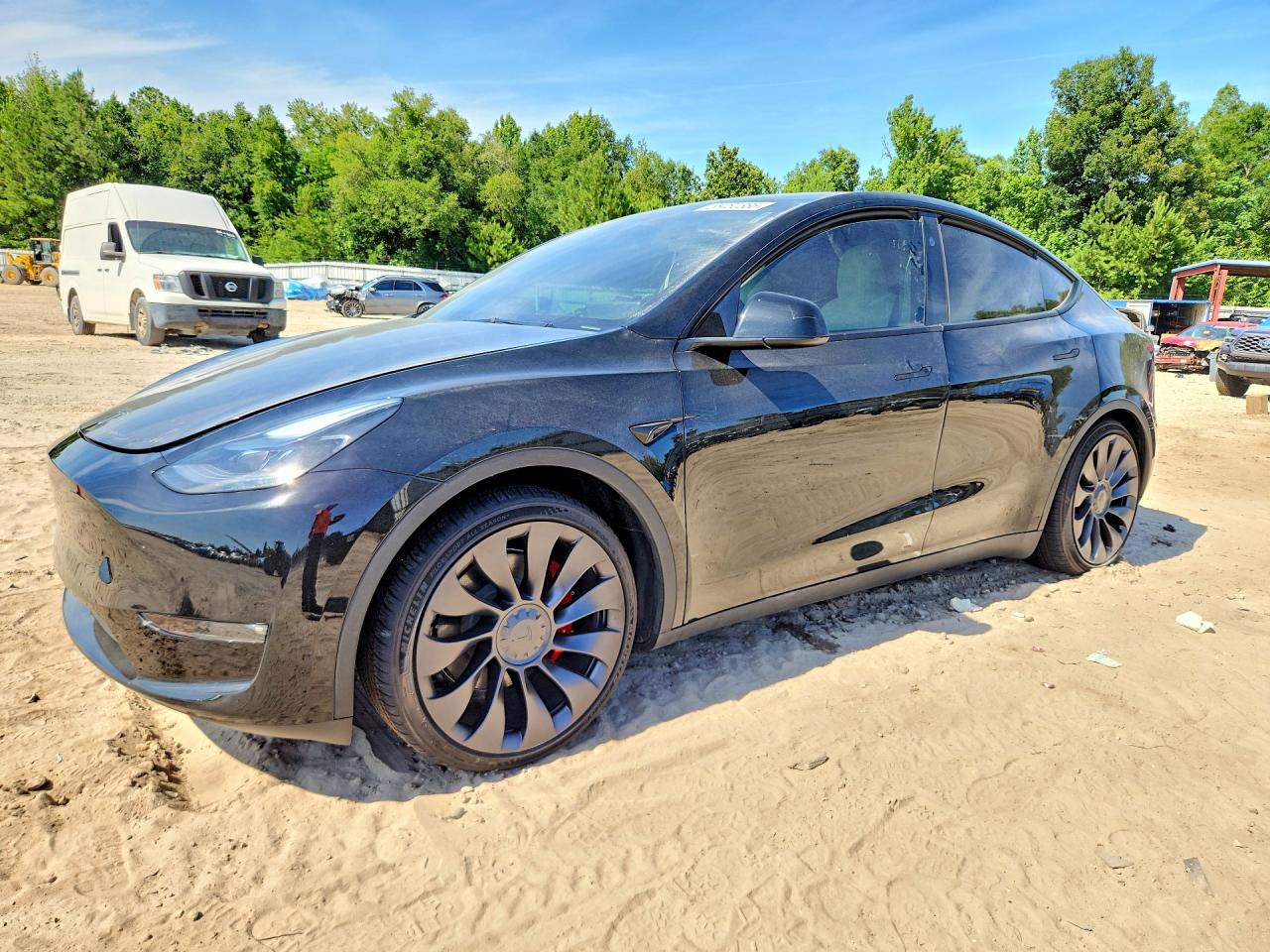 2024 Tesla Model Y Performance, VIN 7SAYGDEF8RF039777 — Side