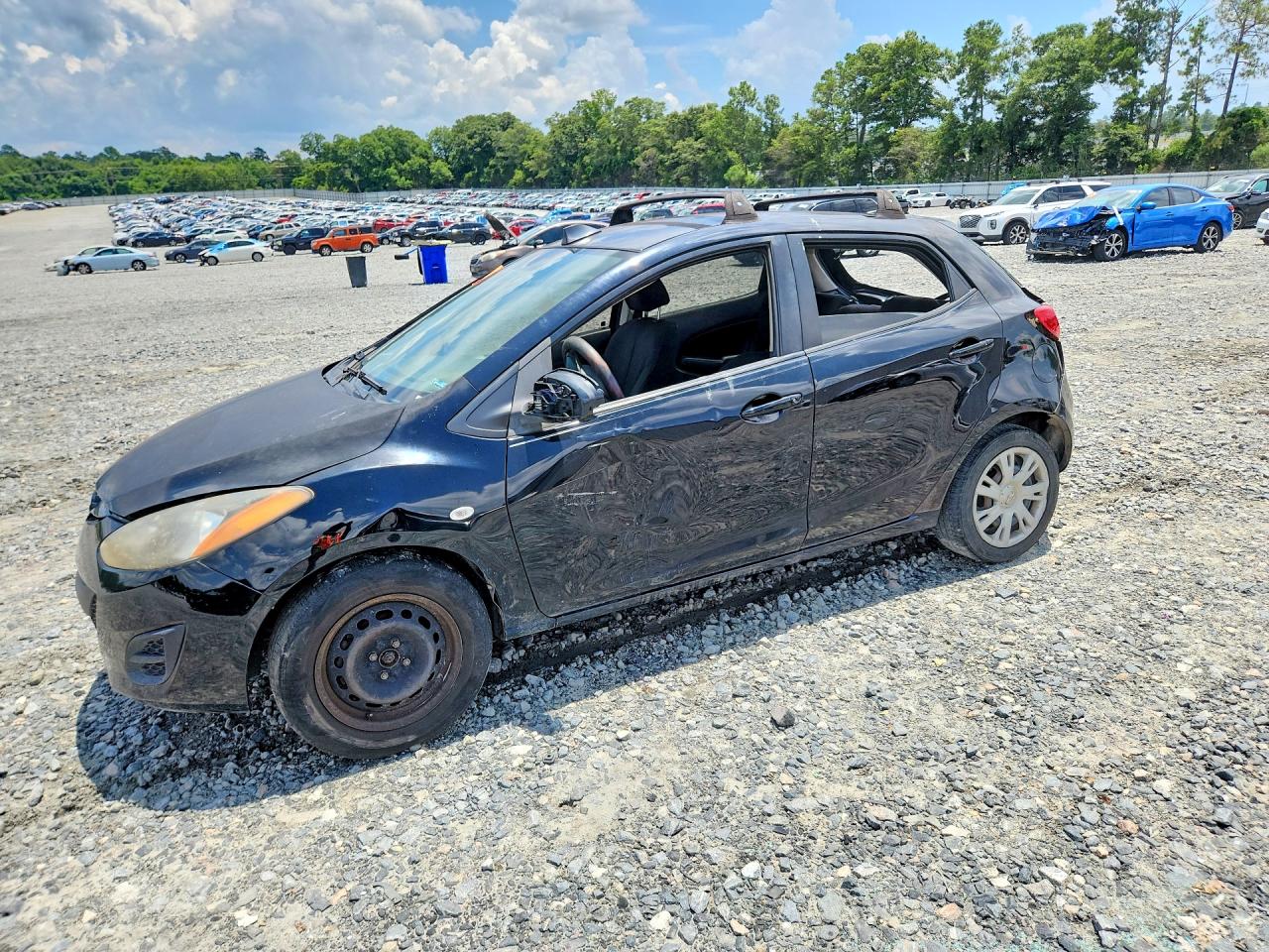 2011 Mazda 2 Sport, VIN JM1DE1HY2B0110232 — Rear end