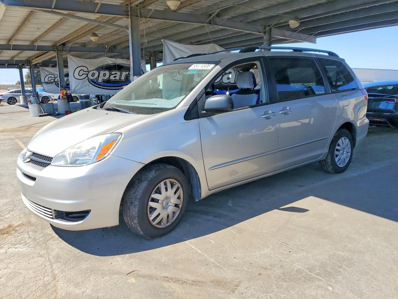 2004 Toyota Sienna LE, VIN 5TDZA23C84S184516 — Side