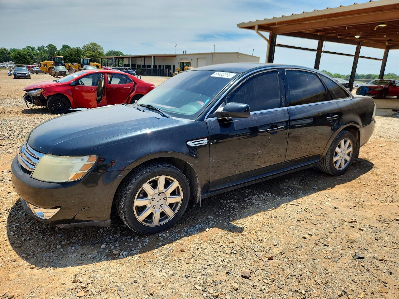 2009 Ford Taurus SE, VIN 1FAHP23W09G108235 — Normal wear