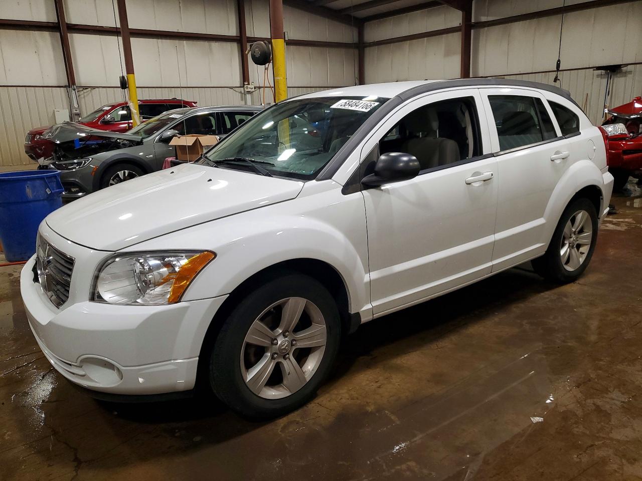 2012 Dodge Caliber SXT, VIN 1C3CDWDA4CD507718 — Зад