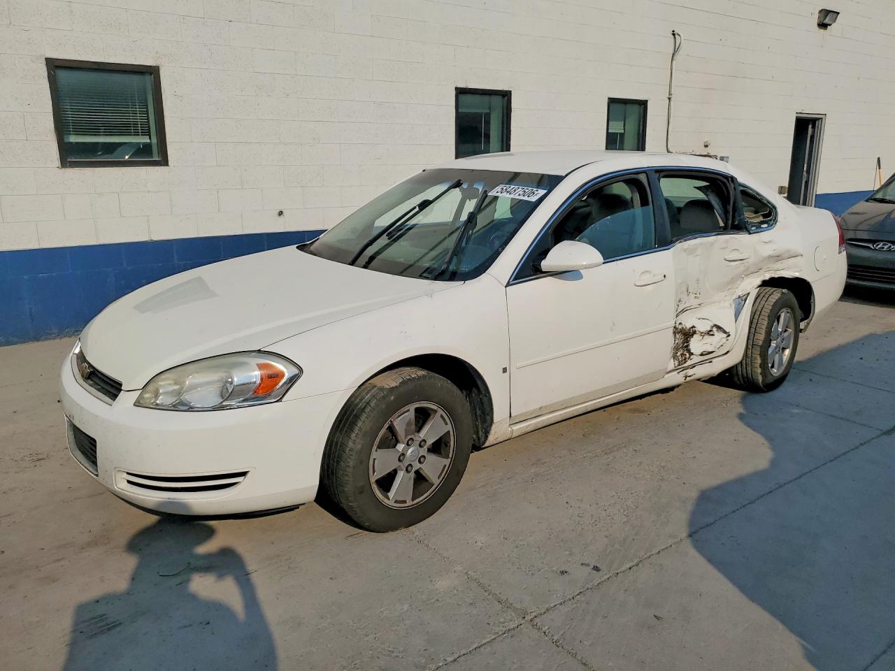 2006 Chevrolet Impala LT 3.5L, VIN 2G1WT58K169122457 — Side
