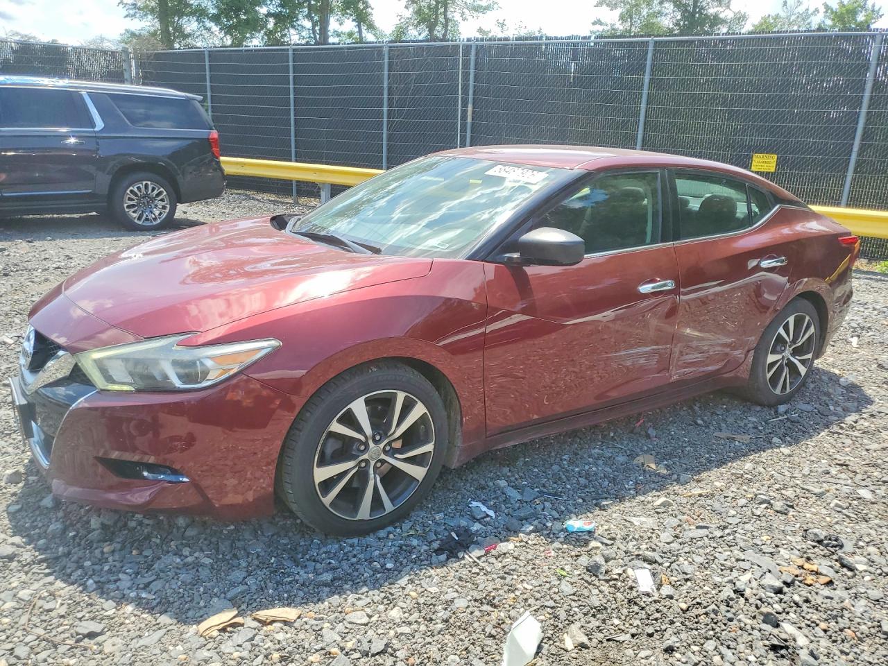 2017 Nissan Maxima SR, VIN 1N4AA6AP1HC436727 — Бок