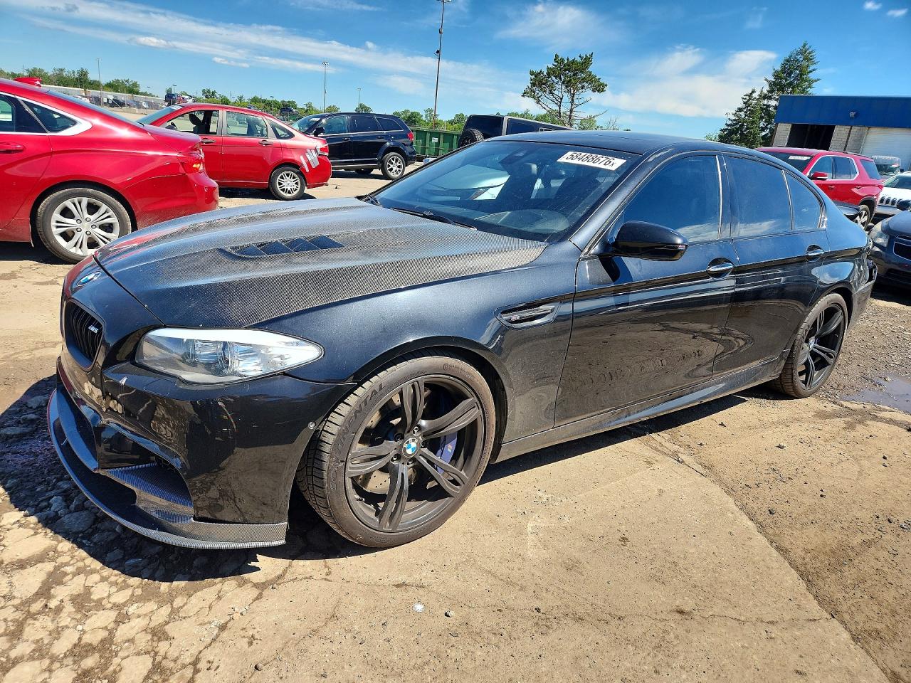 2013 BMW M5, VIN WBSFV9C50DD096291 — Зад
