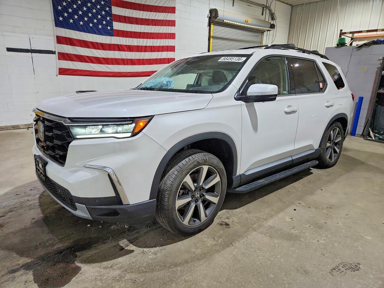 2024 Honda Pilot Elite, VIN 5FNYG1H87RB032229 — Side