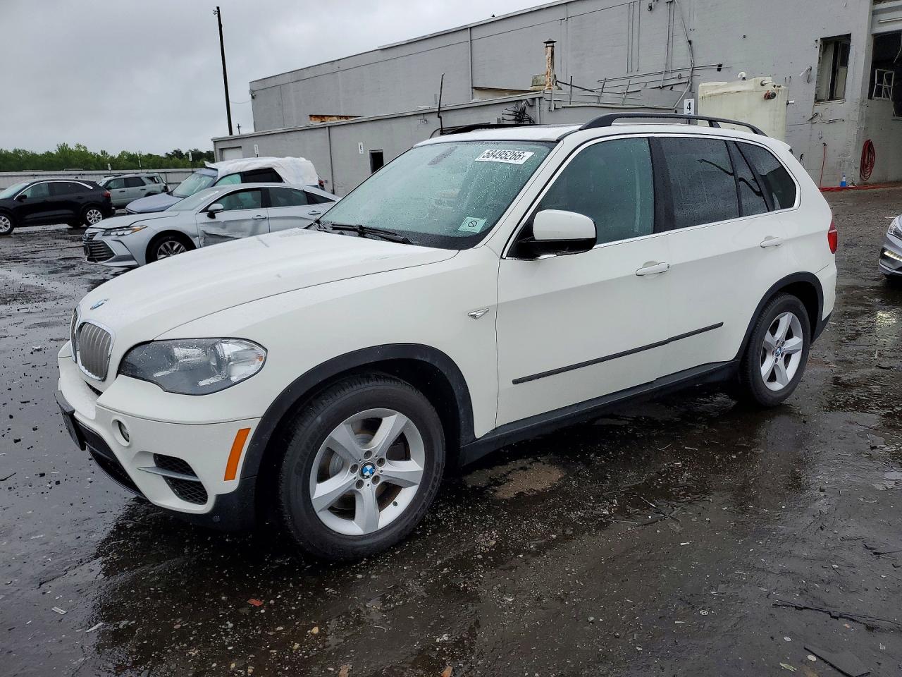 2012 BMW X5 50i, VIN 5UXZV8C51CL422729 — Обычный износ