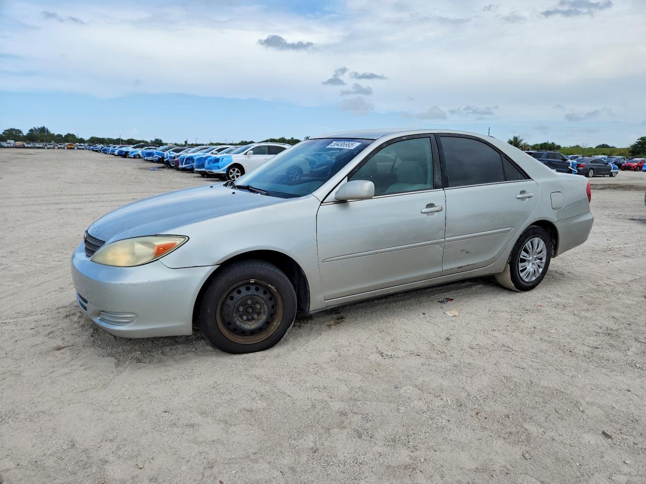 2002 Toyota Camry LE, VIN 4T1BE32K52U029284 — Side