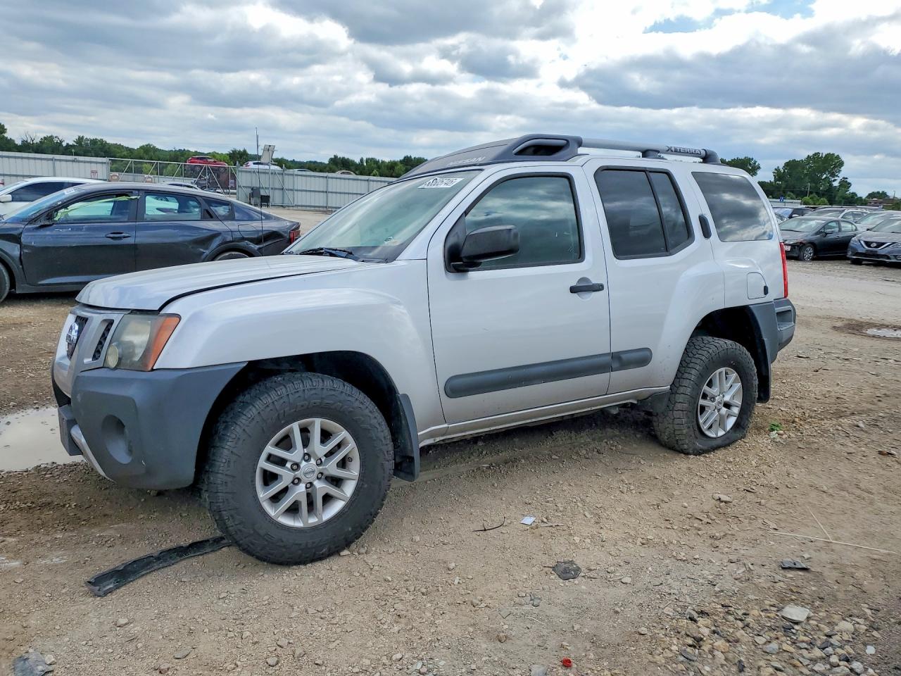 2014 Nissan Xterra X, VIN 5N1AN0NW4EN810126 — Side
