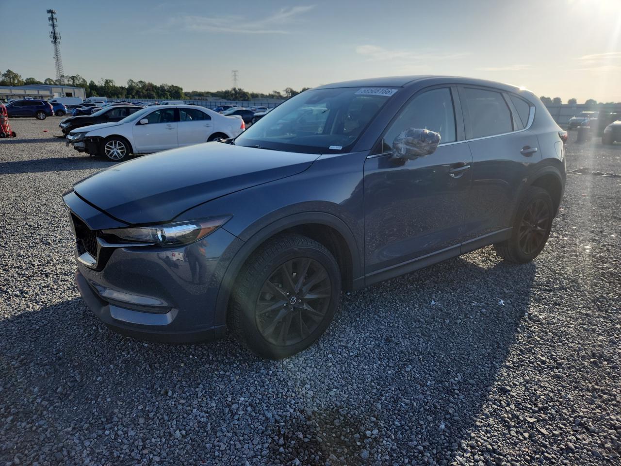 2021 Mazda CX-5 Carbon Edition, VIN JM3KFACM1M0371936 — Front end