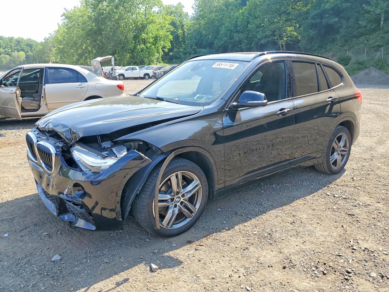 2019 BMW X1 xDrive28i, VIN WBXHT3C51K5N00387 — Front end