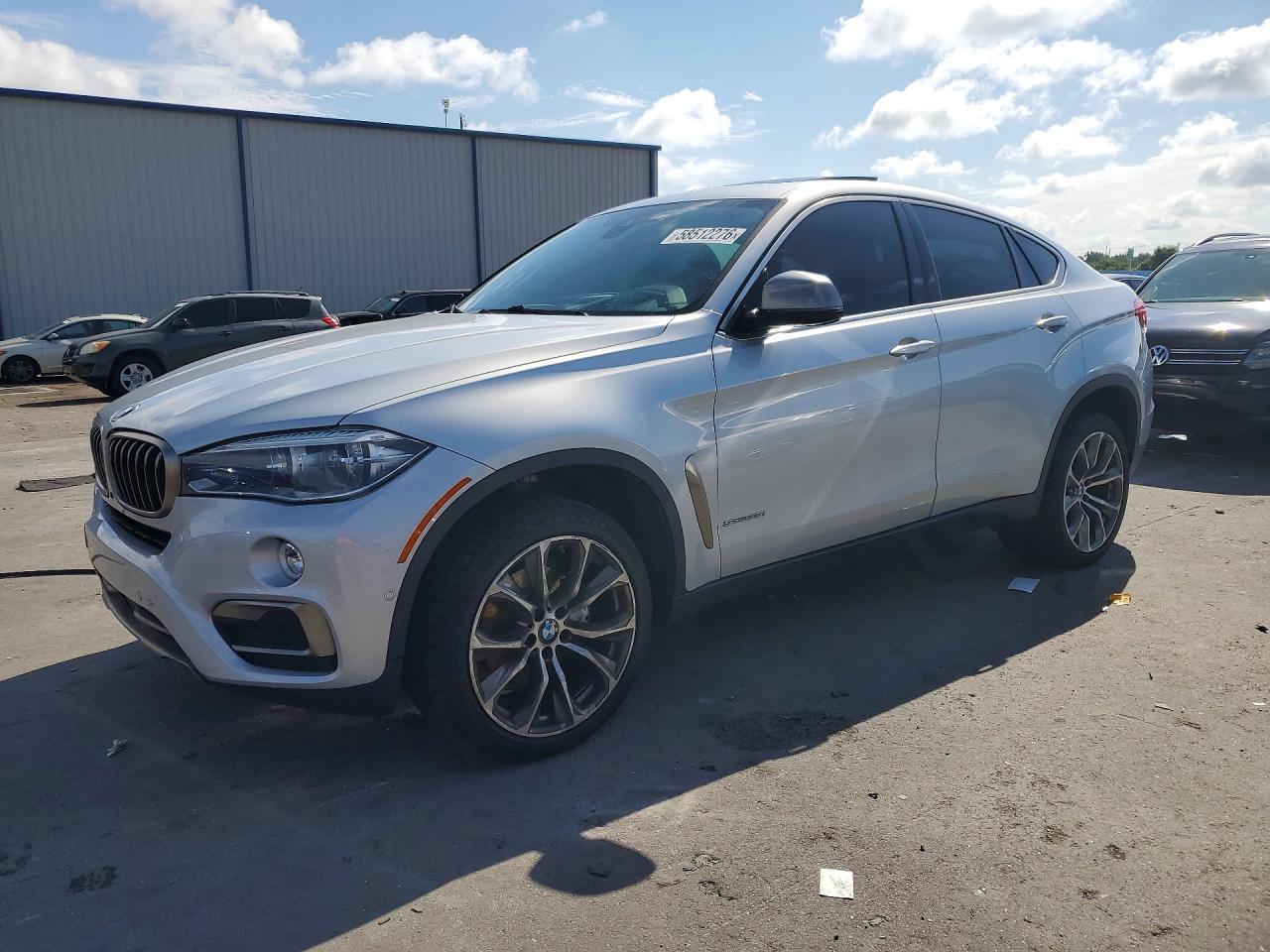 2018 BMW X6 sDrive35i, VIN 5UXKU0C51J0G80773 — Мелкие вмятины и царапины