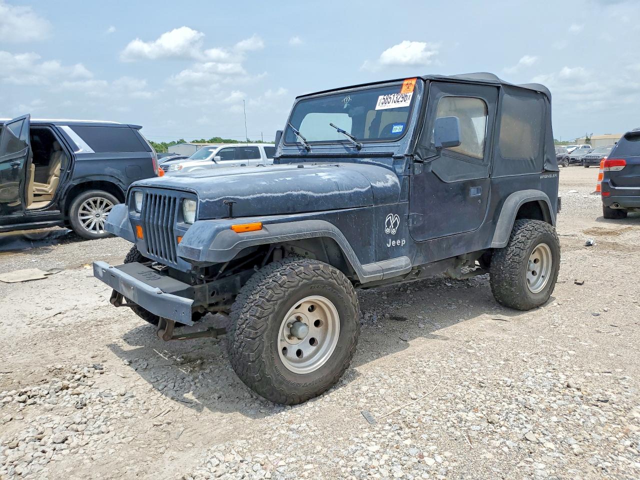 1995 Jeep Wrangler S, VIN 1J4FY19P2SP285460 — Normal wear