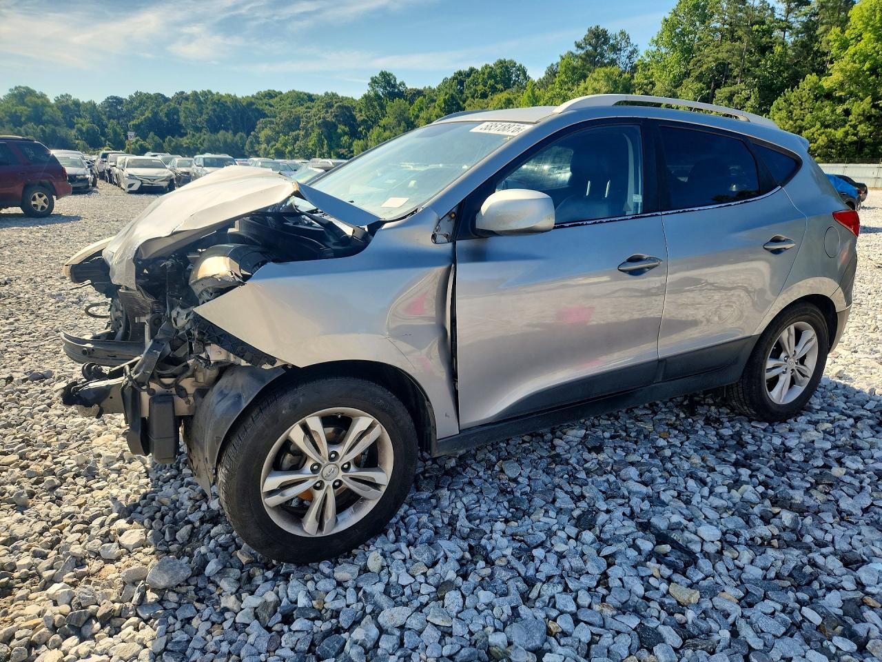 2010 Hyundai Tucson Limited, VIN KM8JU3AC4AU041000 — Front end