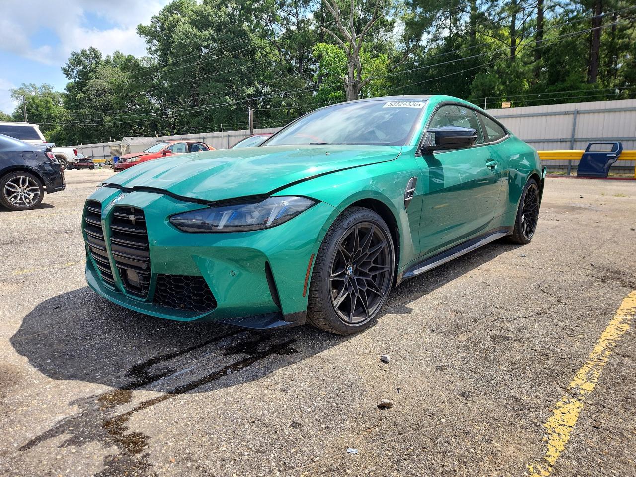 2025 BMW M4 Competition xDrive, VIN WBS33HK0XSCU85886 — Side
