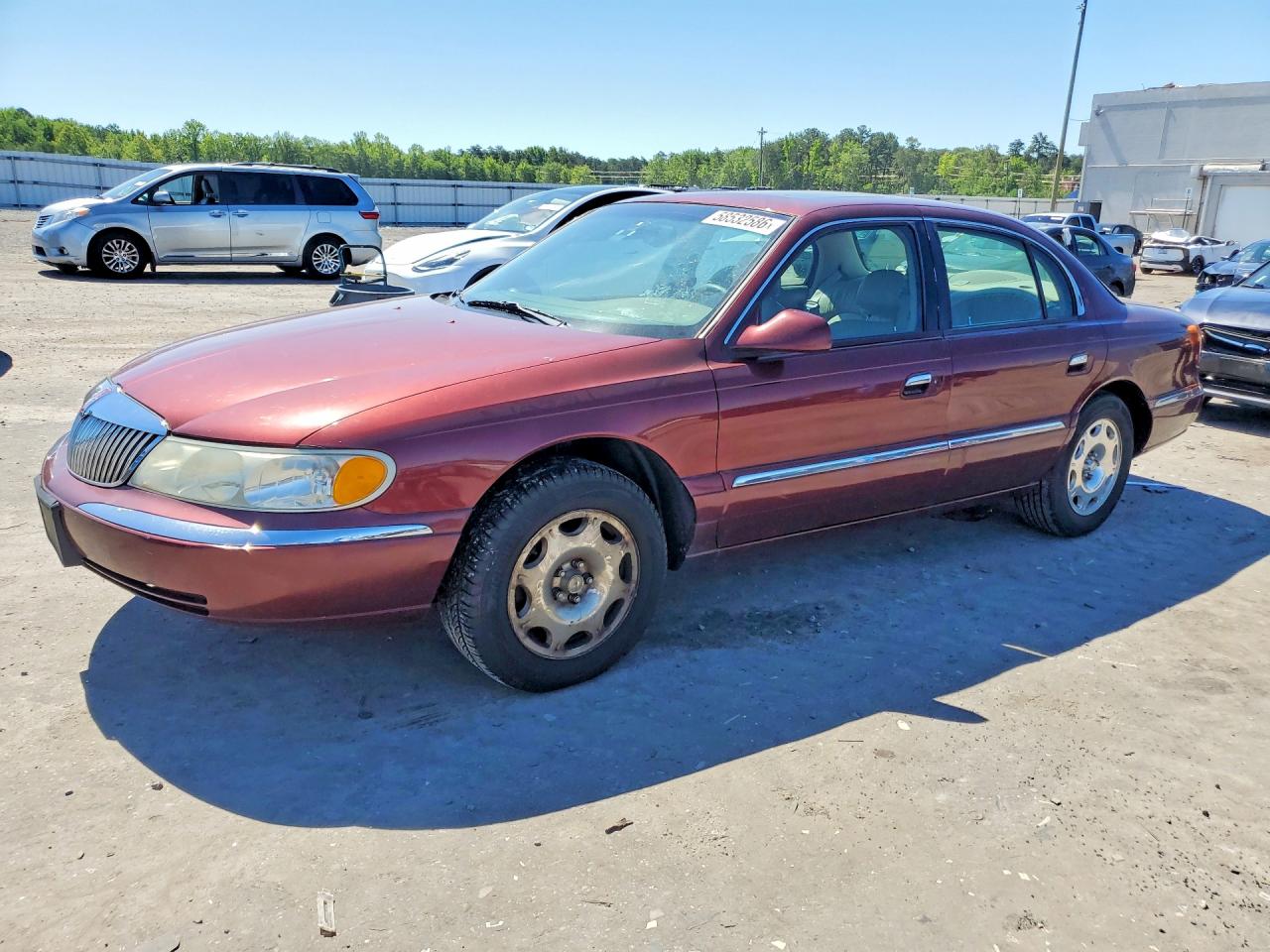 2002 Lincoln Continental, VIN 1LNHM97V92Y624148 — Мелкие вмятины и царапины